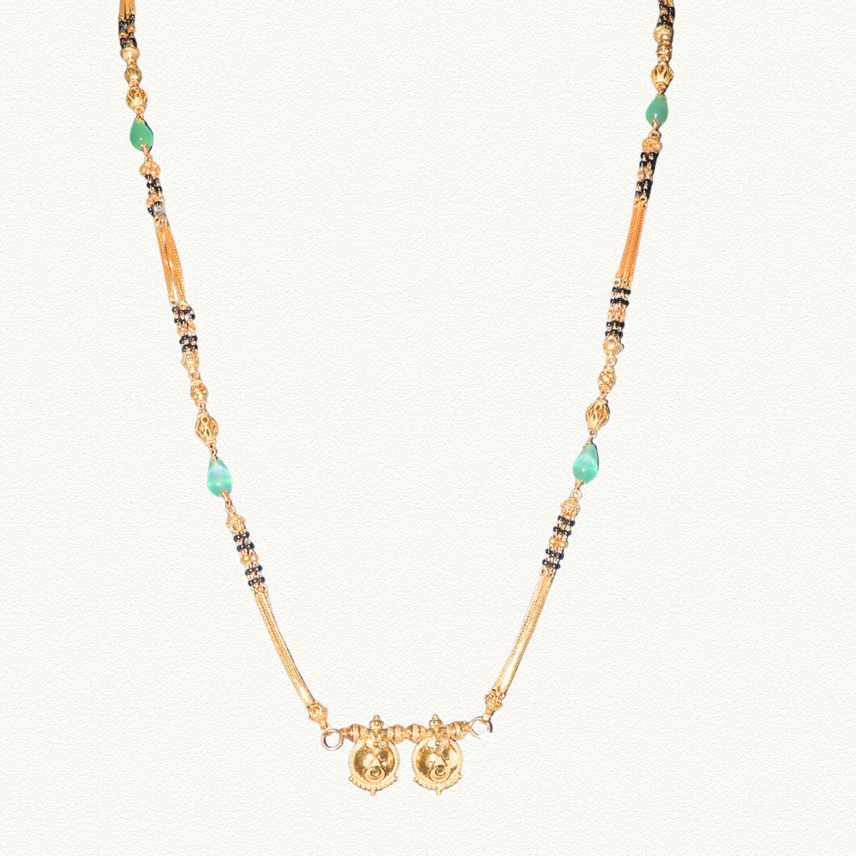 Emerald Bloom 22K Gold Black Bead Pinjara Ganthan