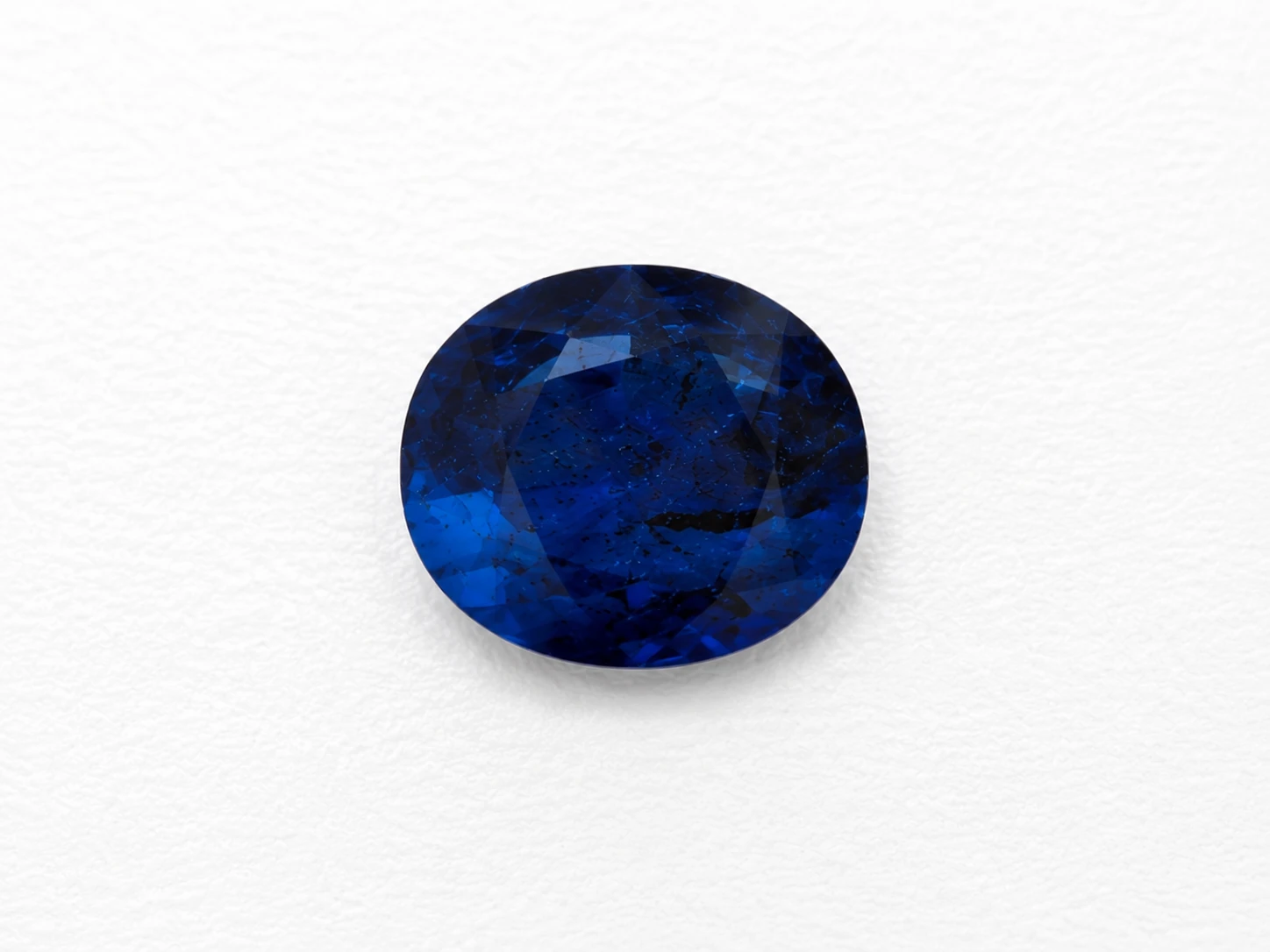 Deep Blue Crown 8.41 Carat Round Blue Sapphire (Neelam) Gemstone side view