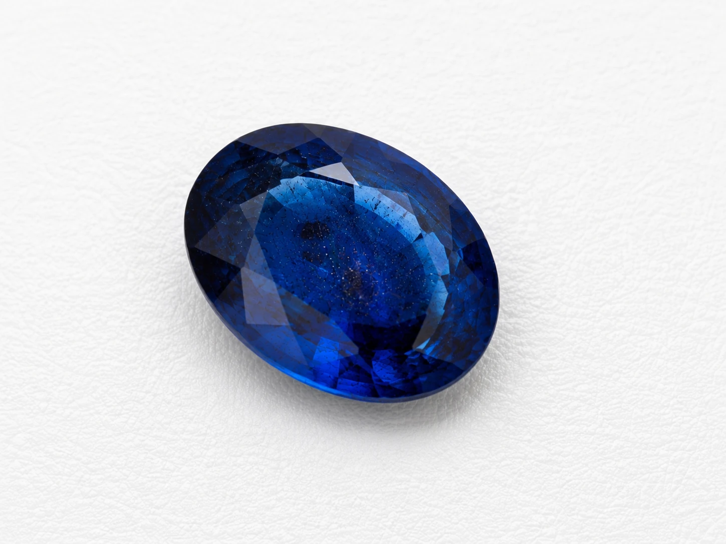 Royal Blue Depth 5.67 Carat Oval Blue Sapphire (Neelam) Gemstone side view