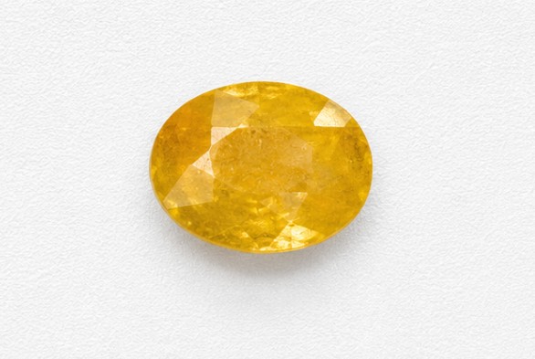 Amber Shine 4.16 Carat Oval Yellow Sapphire (Pushkaraj) Gemstone
